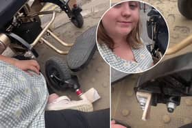 Abbie McMahon, 25, claims she was flung from her wheelchair when the wheel broke after getting stuck in a dropped kerb. 