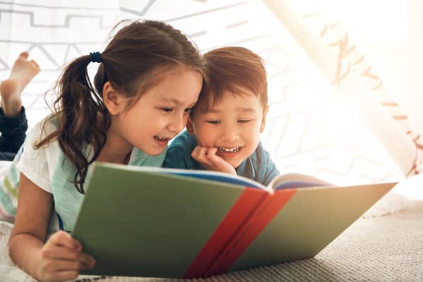 The list of top books children should read before they’re four include The Gruffalo by Julia Donaldson, The Tiger Who Came to Tea by Judith Kerr, and the Michael Rosen classic – We’re Going on a Bear Hunt