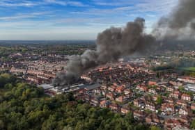 Aerial images show fire fighters tackling flames of a huge fire in Manchester 