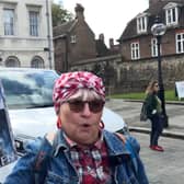 Protester speaks at winter fuel cuts rally.