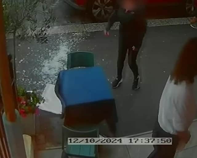 Video grab from this shocking footage shows an alleged attack on restaurant staff - in a dispute over paying a bill  at La Bella Vista in Hastings, East Sussex.