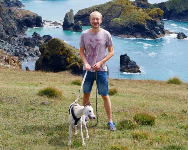 Billy the whippet with owner Chris Cooper.
