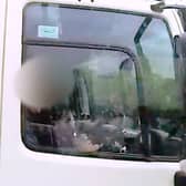 Shocking footage shows HGV driver caught eating yoghurt at the wheel