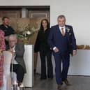 Neil Crossley walks down the aisle at his daughter's wedding, forgetting to take her with him.