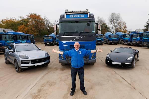 Jimmy Callaghan, Omaze double Porsche Early Bird winner with his brand new Cayenne and Boxter cars alongside his work lorry. 