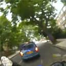 Thug rams police officer off his bike during high-speed pursuit.