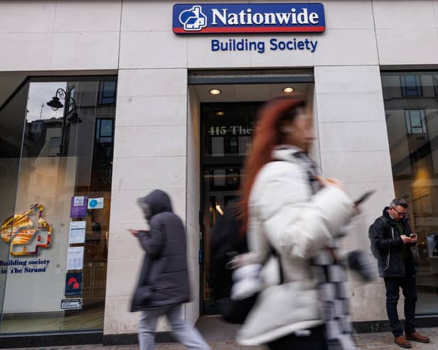 Members of the public walk past the Nationwide Building Society in London (Photo: Dan Kitwood/Getty Images)