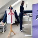 Julie Herman turns people's football shirts into puffer jackets.