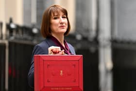 Rachel Reeves, poses with the red Budget Box as she leaves 11 Downing Street to present the government's annual budget to Parliament in October 2024 (Photo: Leon Neal/Getty Images)