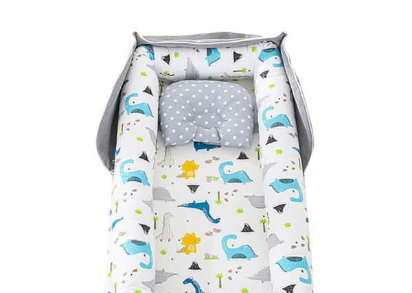 Recalled Style Life Eleven Portable Baby Loungers in the Pattern of Grey/Blue/White Dinosaur