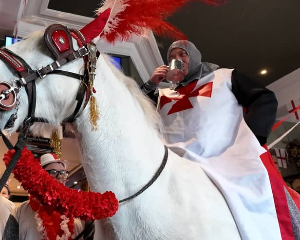 Landlord Chris Bracegirdle rides into the Bloomfield Brewhouse on horseback for St Georges Day.