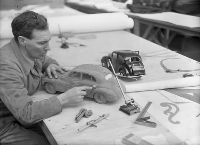 Cowley factory Morris Motors 1947. Working on a clay model of the Morris Oxford MO next to a completed model of the Morris Eight.