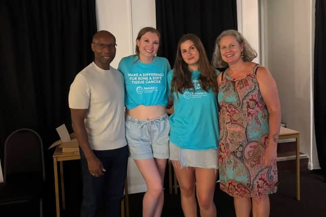 Aaliyah's parents, Leroy (far left) and Angie Godfrey (far right) with members of the Specsavers Warwick team, Mia and Eve, during the quiz night.