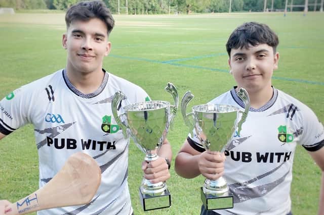 Kenilworth duo Issac Curtis, left, and Charlie Hamill with their All Britain Champions Trophies