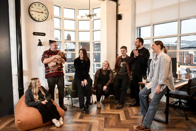 Seven of the ADA Digital team in its office at Talisman Shopping Centre