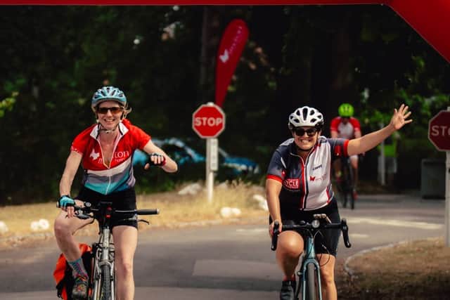 Cyclists crossing the finish line at this year’s Cycle Challenge.