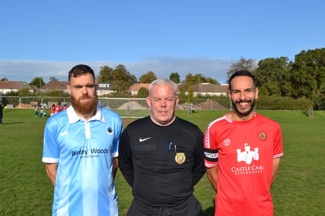 Referee Micky Bell with Coventry and Kayi captains Andrew Watts and Youcef El Barhdadi.