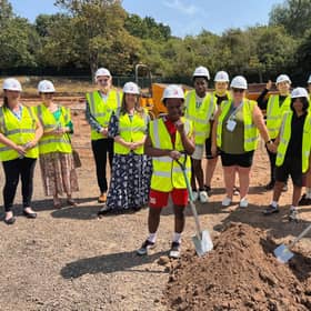 Pupils and staff from Baginton Fields Academy take part in a ceremonial construction launch event.