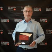 Kenilworth's Keene named ‘Industry Legend’ as Aurrigo win two titles at the Self-Driving Industry Awards