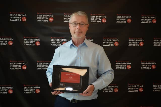 Miles Garner, Chief Commercial Officer at Aurrigo International, accepts the Industrial Design accolade at the Self-Driving Awards.