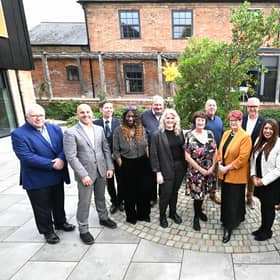 Business and civic leaders gather to watch the Budget