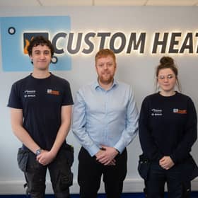 Two of Custom Heat & Cool’s former apprentices, now fully qualified engineers with the company, alongside Managing Director Lincoln Smith (centre).