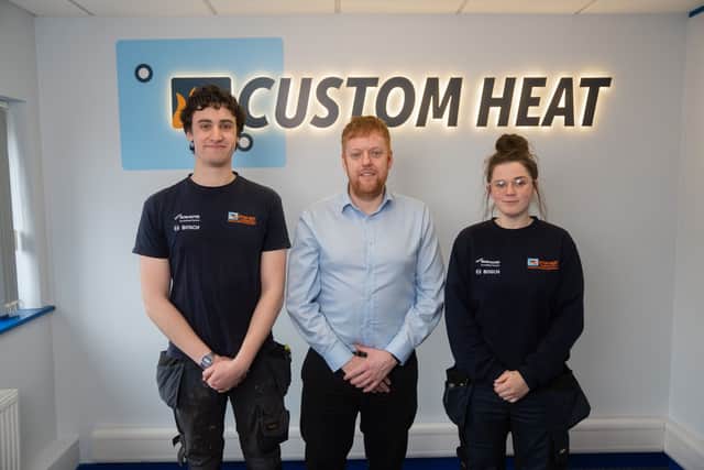 Two of Custom Heat & Cool’s former apprentices, now fully qualified engineers with the company, alongside Managing Director Lincoln Smith (centre).