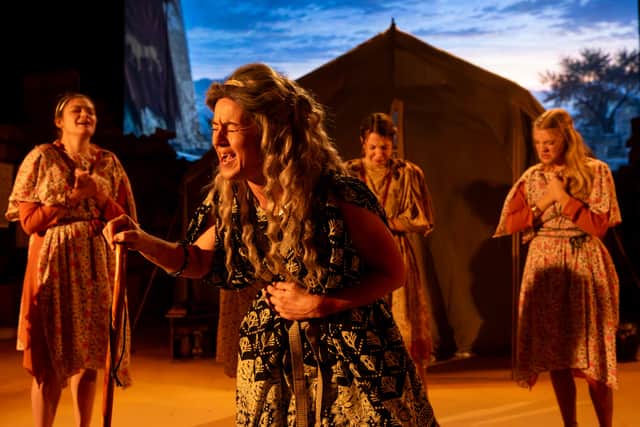 Hannah Grainger Clemson as Hecuba and members of the Chorus in The Women of Troy