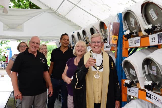 John Atkinson 2018/19 Bailiff of Warwick Court Leet with a group of volunteers waiting to open the bar at this years festival. Photo by Gill Fletcher