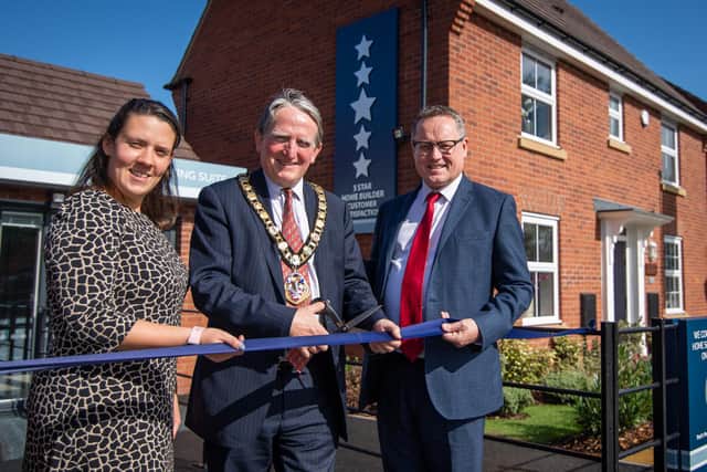 Cllr Kettle with Dominic Harman and David Wilson Homes Senior Sales Manager, Philippa Stewart
