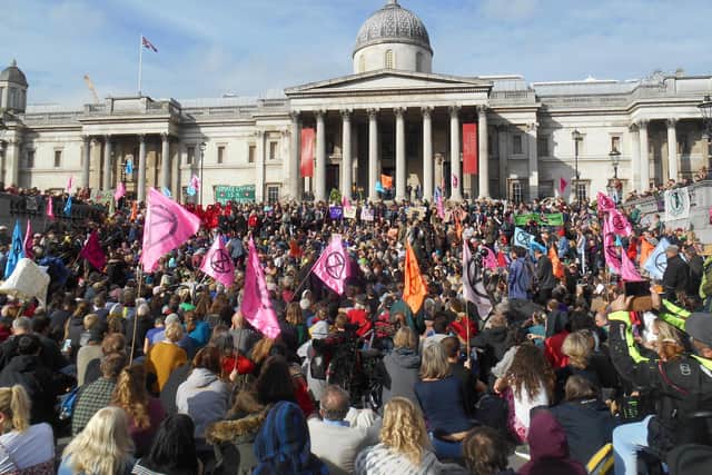 Extinction Rebellion members protest in Trafalgar Square.