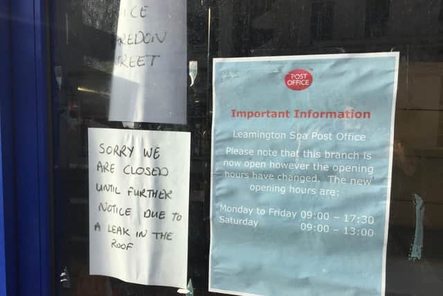 The signs in the window at the Post Office in Bath Street, Leamington.
