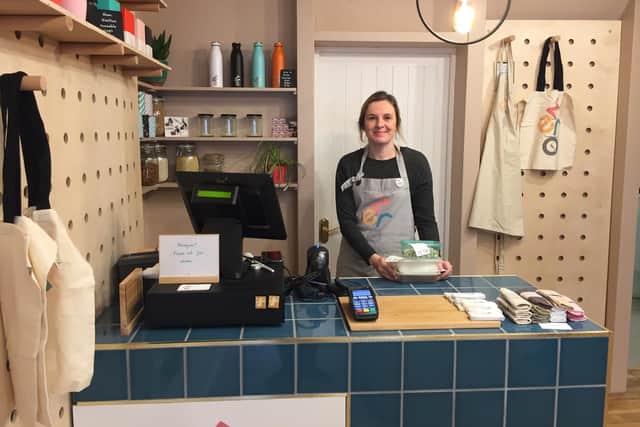 Charlie Demetriou at the counter in her new Zero store in Leamington.