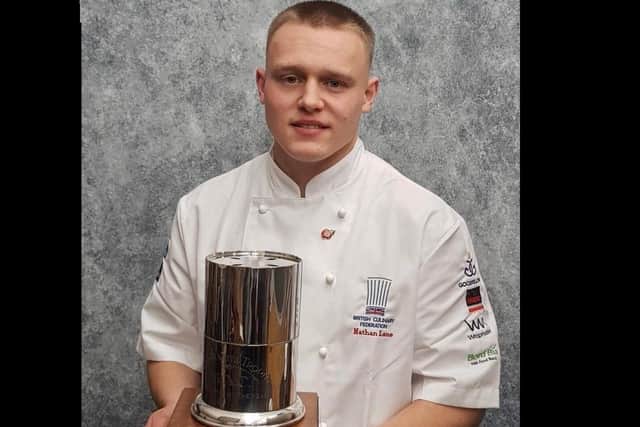 Chef Nathan Lane holding his trophy