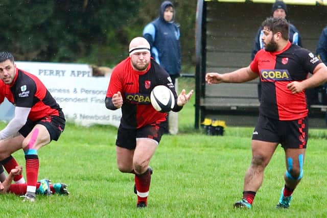 Stu Houghton passing in Saturday's game against Dudley Kingswinford,  with Lee Lightowler and Ben Hartwell