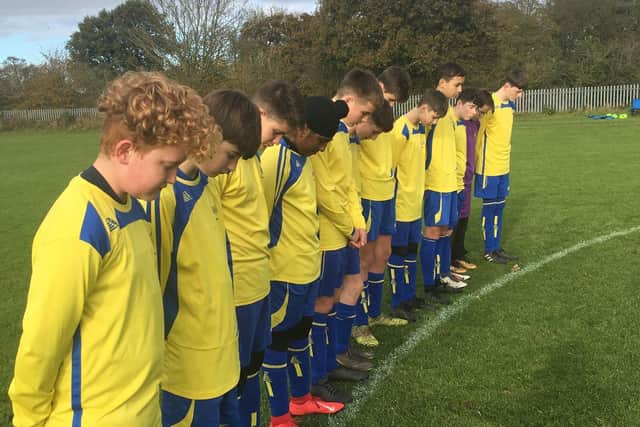 Brinklow Under 15s observe a minute's silence on Remembrance Sunday