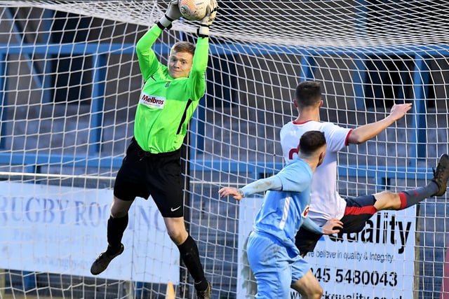 Goalkeeper Matt Hill makes a save