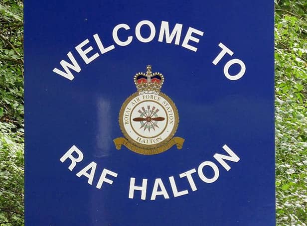 RAF Halton's welcome sign incorporates the five arrows of the Rothschild coat of arms as well as an aeroplane propeller.