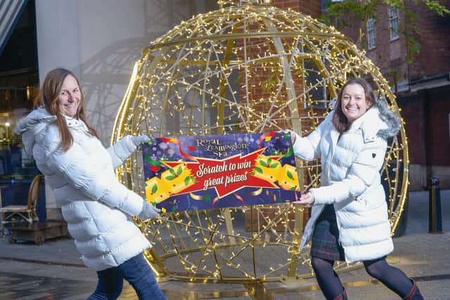 Pictured pulling the Christmas Cracker Scratchcard are, left to right, Alison Shaw (BID Leamington Project Manager) and Stephanie Kerr (BID Leamington Executive Director).