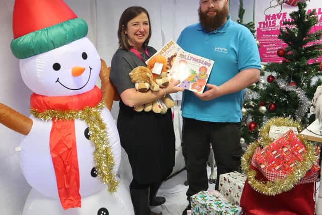Rachel Ollerenshaw and Sam Dunn promote the Christmas toy collection for Molly Olly's Wishes taking place at Jump In trampoline park in Warwick.