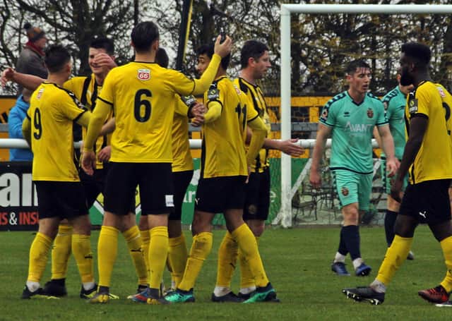 Brakes players congratulate Connor Taylor after he opened the scoring against Spennymoor.