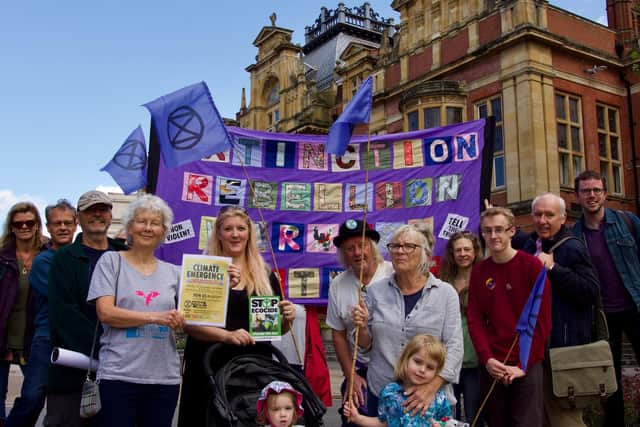 Members of the Warwick district branch of Extinction Rebellion outside Leamington Town Hall.