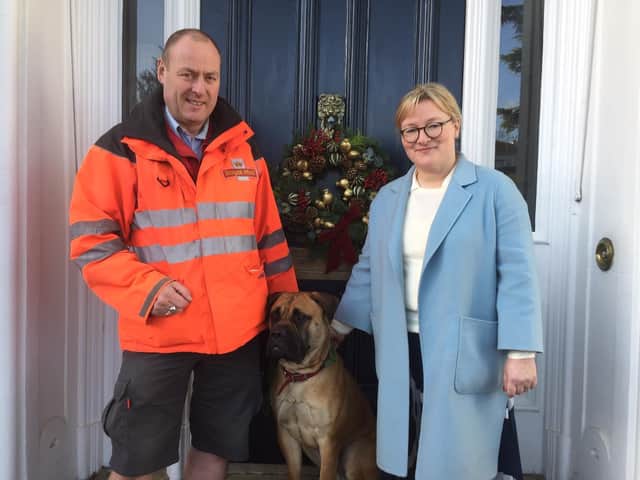 Royal Mail Postman Steve Malin with Peggy and her owner, Alice Broadfield