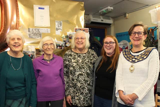 Kenilworth Mayor Alison Firth, the Cancer Research UK charity shop of Kenilworth manager Emma Thornett and three volunteers who have been there since the store opened.