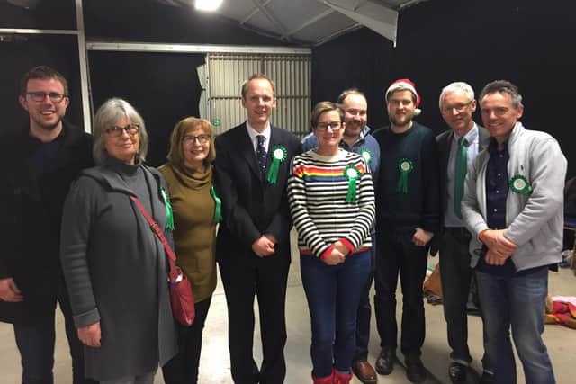 Jonathan Chilvers Green part candidate for Warwick and Leamington) and Alison Firth (Green Party candidate for Kenilworth and Southam) with other Green Party members) at the election counts at Stoneleigh Park.