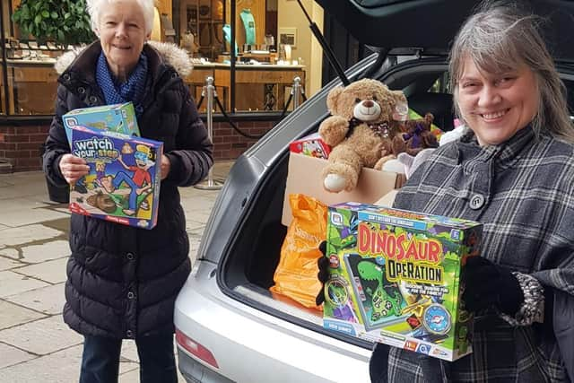 Volunteer Wendy Nealon and front of house staff member Natalie Harries with some of the donations. Photo submitted.