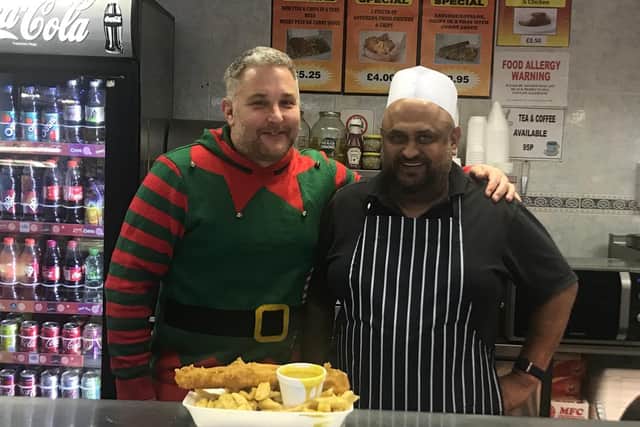 Cllr Jody Tracey with one of the chefs at Spinney Hill Chippy. Photo submitted.