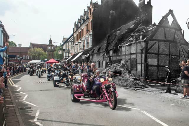 North Street, with a fire-damaged cottage and a recent BikeFest parade