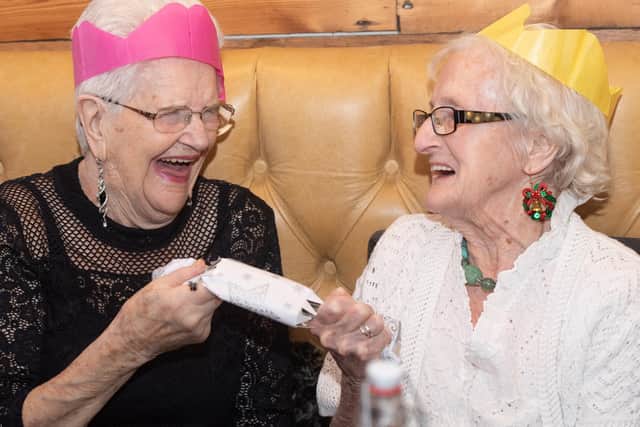 Galanos house residents enjoy the Christmas Lunch.