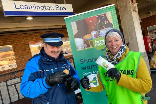 Samaritan volunteers with a member of British Rail staff at Leamington Railway Station. Photo supplied